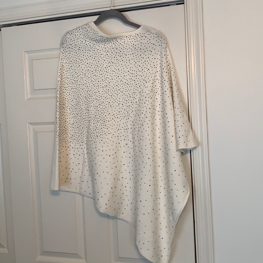 Cream sweater poncho with sparkle details